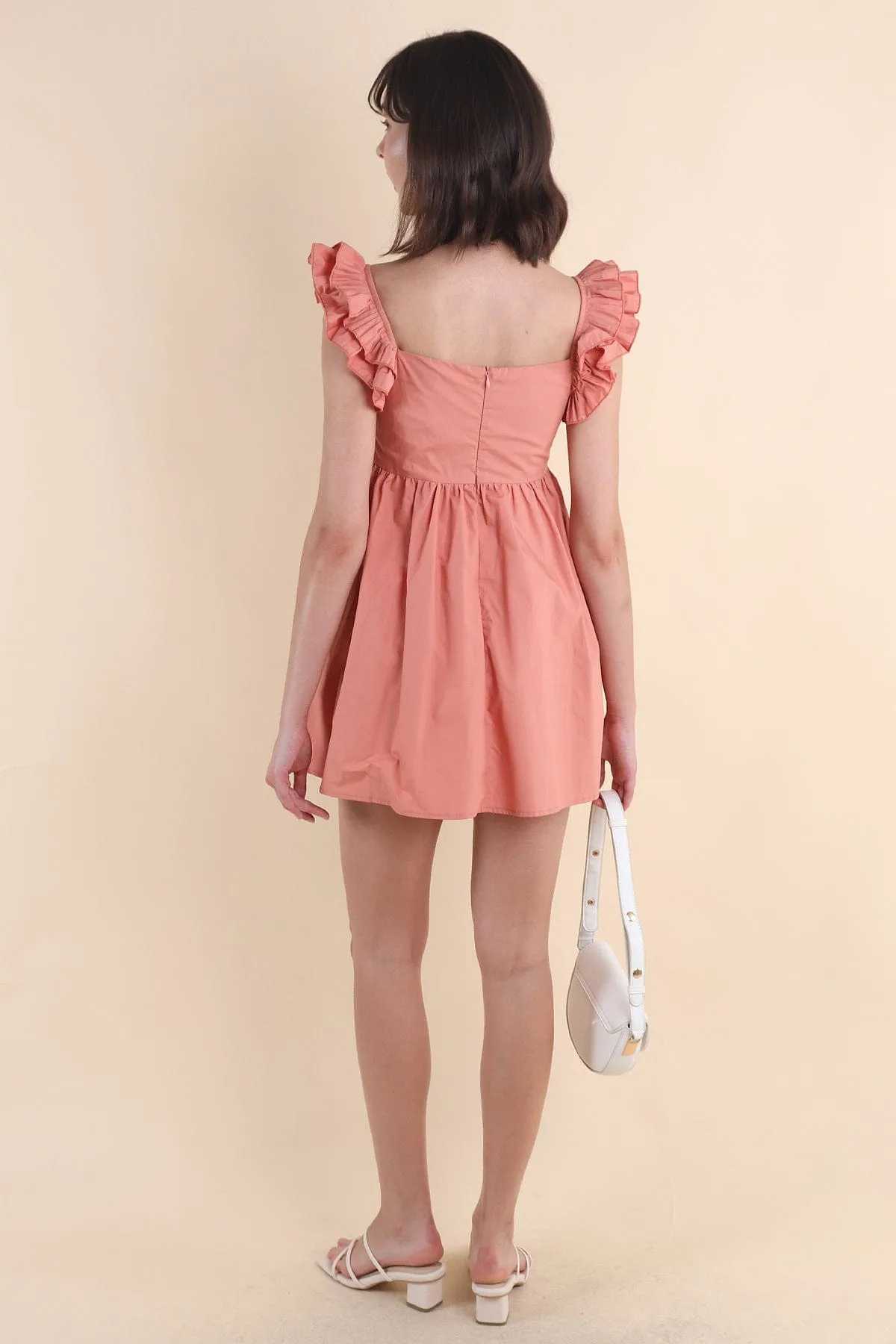 SAMMI ROMPER DRESS IN PEACH TEA