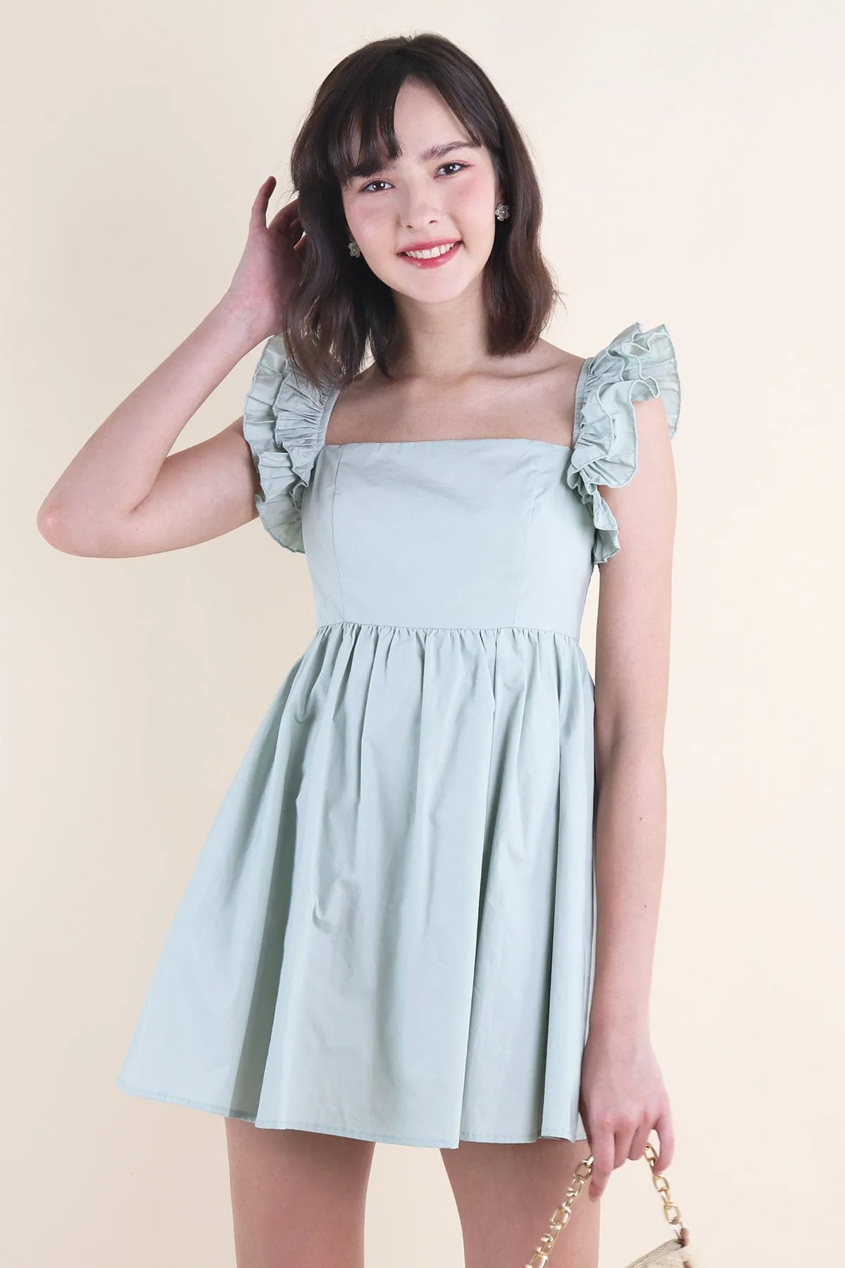 SAMMI ROMPER DRESS IN TEA SAGE